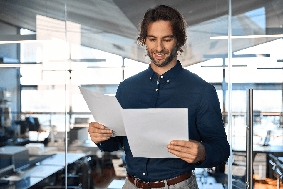 happy-young-business-man-executive-checking-financ-2026-01-08-00-17-07-utc 1 (1)